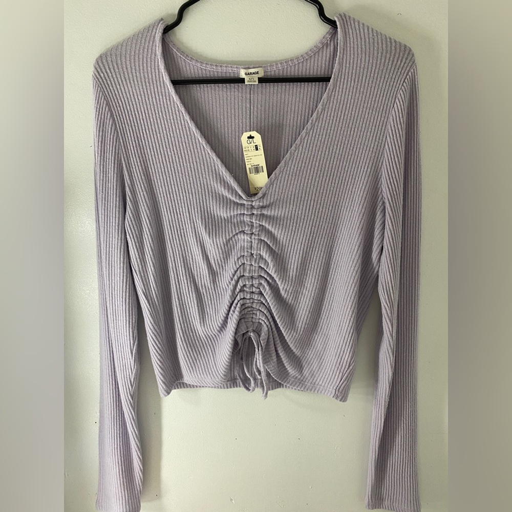Pretty lilac top that can be both cute and casual, never worn with tags